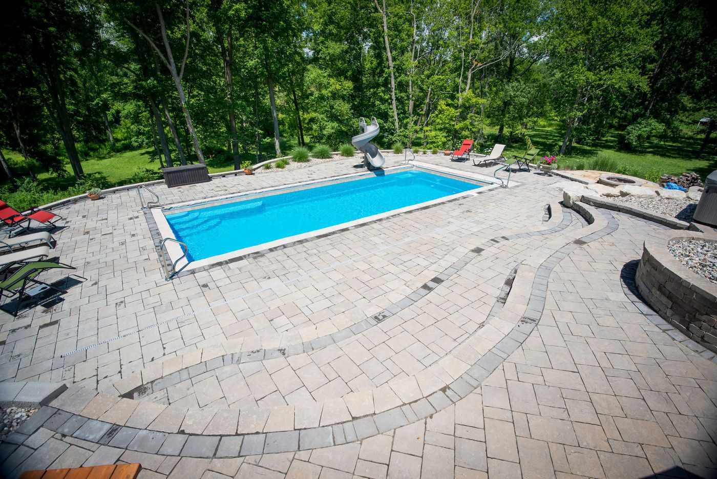 fiberglass pool with retaining wall