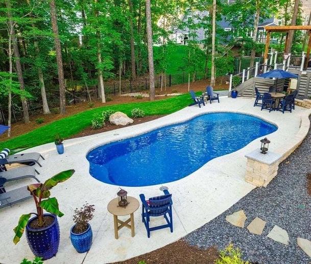 001. Aerial view of a gorgeous backyard featuring our C35 pool